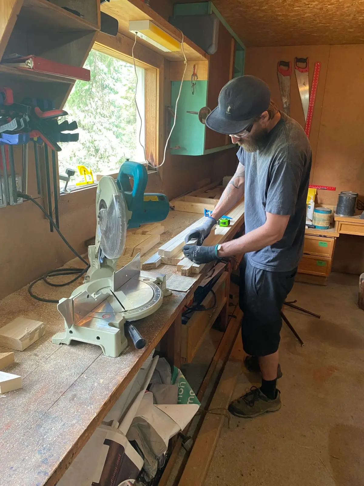 Cutting cedar stretcher-bar stock on the miter saw in Winlaw